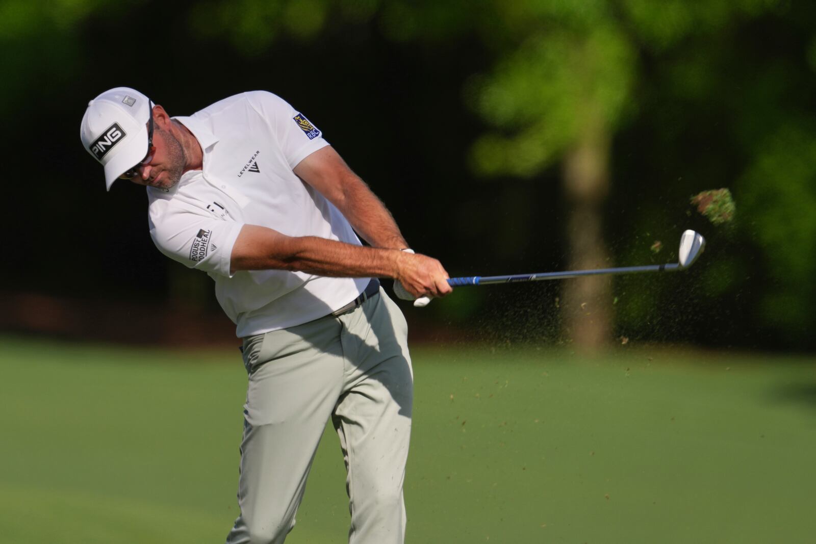 Corey Conners, of Canada, hits his tee shot on the 12th hole during the third round at the Masters golf tournament, Saturday, April 12, 2025, in Augusta, Ga. (AP Photo/Matt Slocum)