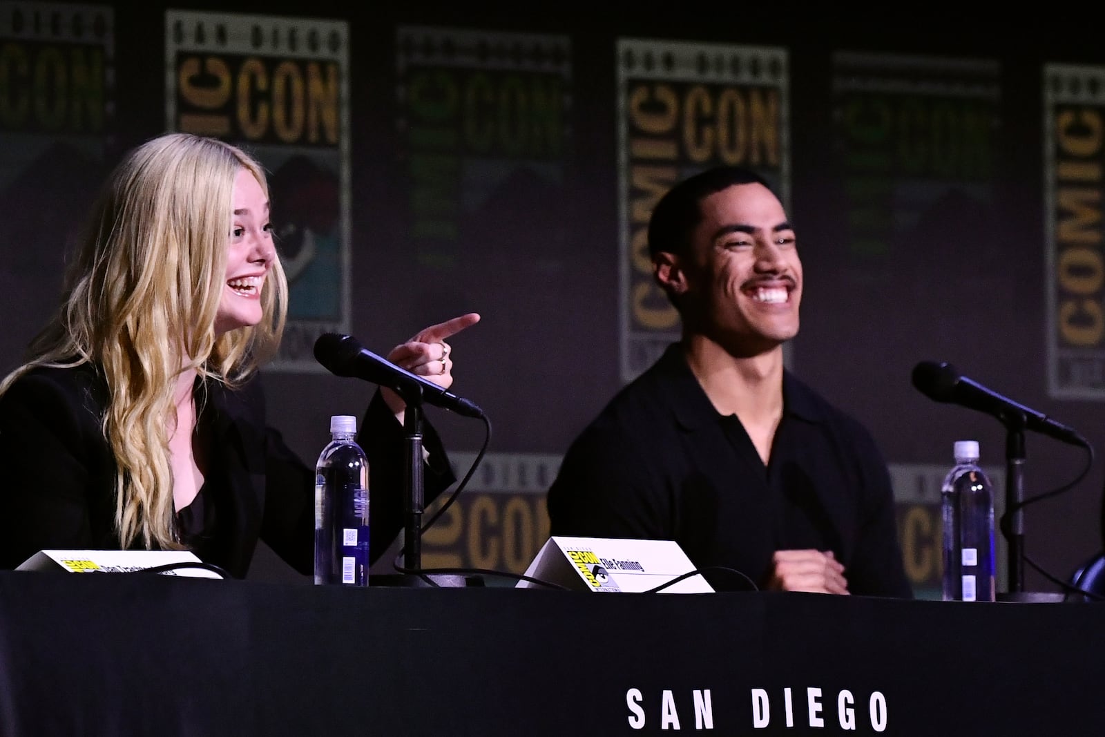 Elle Fanning, left, and Dimitrius Schuster-Koloamatangi attend a panel for "Predator: Badlands" during Comic-Con International on Friday, July 25, 2025, in San Diego. (Photo by Richard Shotwell/Invision/AP)