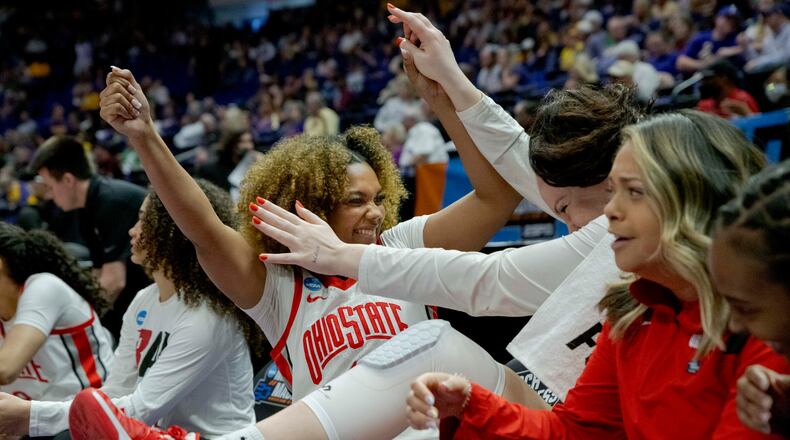 Ohio State guard Anyssa Jones (3) and forward Rebeka Mikulasikova (23) celebrate as their team takes the lead against Missouri State late in the fourth period of a women's college basketball game in the first round of the NCAA tournament, Saturday, March 19, 2022, in Baton Rouge, La. (AP Photo/Matthew Hinton)