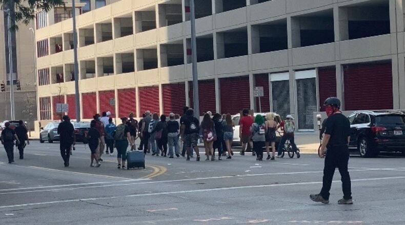 Protestors march for the release of George Lail in Dayton on Saturday, Sept. 12, 2020. India Duke/STAFF