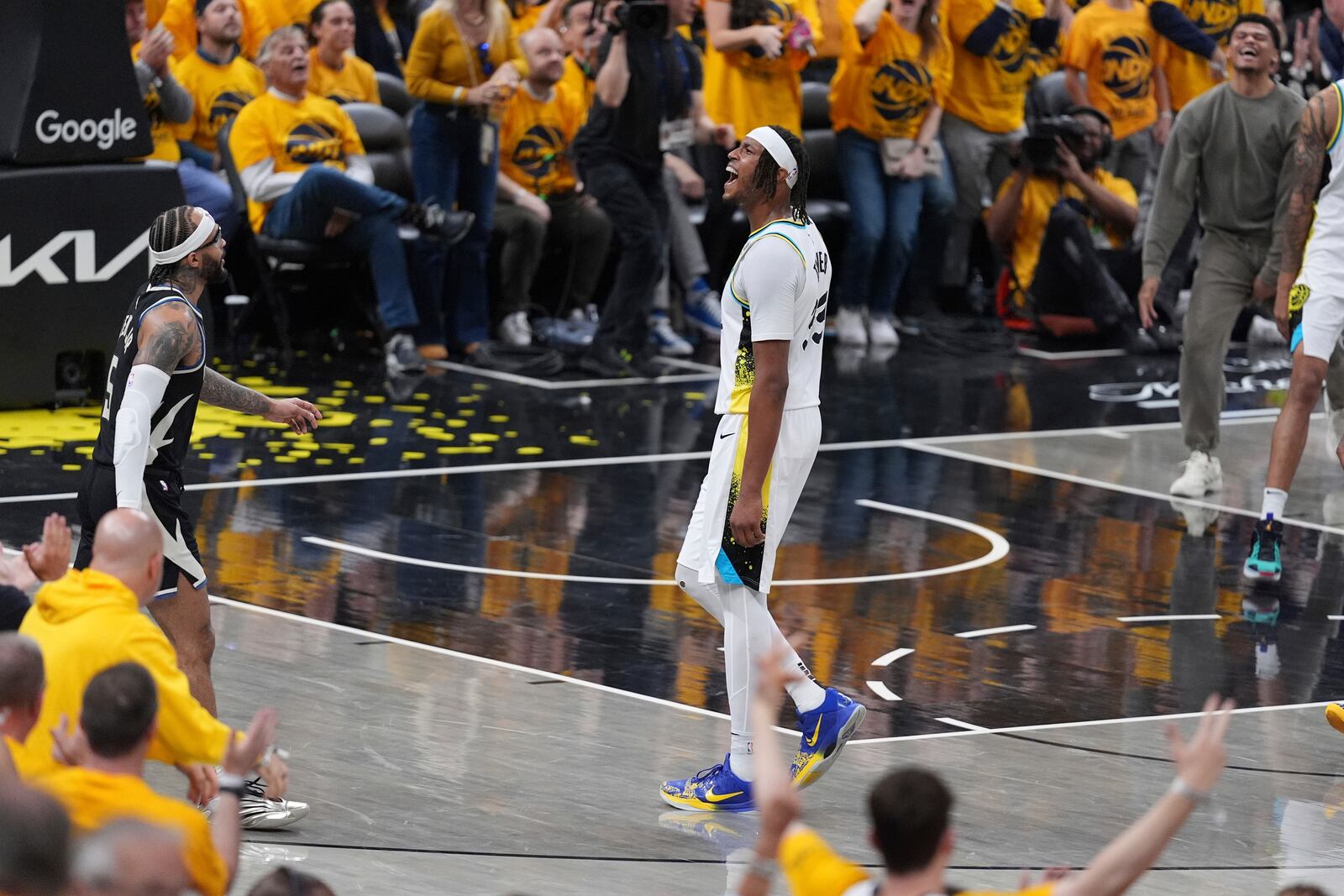 Indiana Pacers' Myles Turner celebrates after making a 3-point basket during the second half of a first-round NBA basketball playoff game against the Milwaukee Bucks, Saturday, April 19, 2025, in Indianapolis. (AP Photo/Michael Conroy)