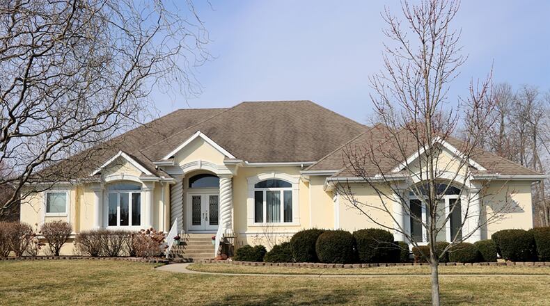 The 5 bedroom, 5-bath ranch home has about 5,750 sq. ft. of living space, including the walk-out lower level. More than 3,900 square feet of living space is on the main level. There is a 3-car, side-entry garage with extra storage nooks. CONTRIBUTED PHOTO BY KATHY TYLER