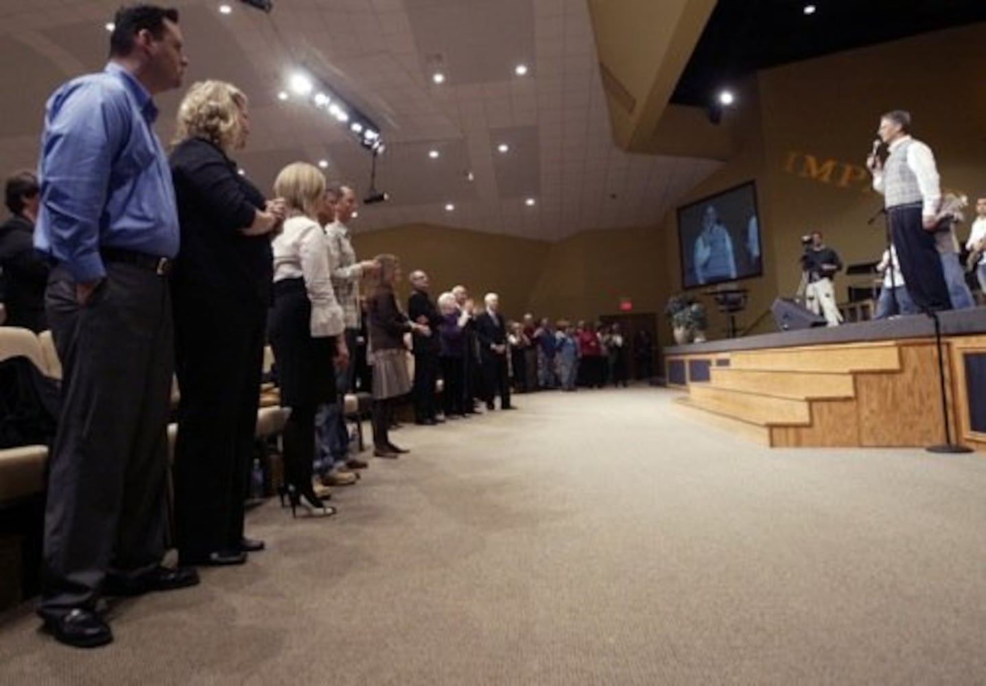 Injured pastors return to church