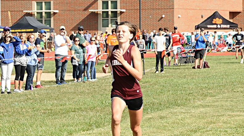 Faith Duncan’s victory in 17 minutes, 51.6 seconds won the girls Division I-II big school division at Saturday’s Bob Schul Invitational and helped Lebanon win the team title. GREG BILLING / CONTRIBUTED