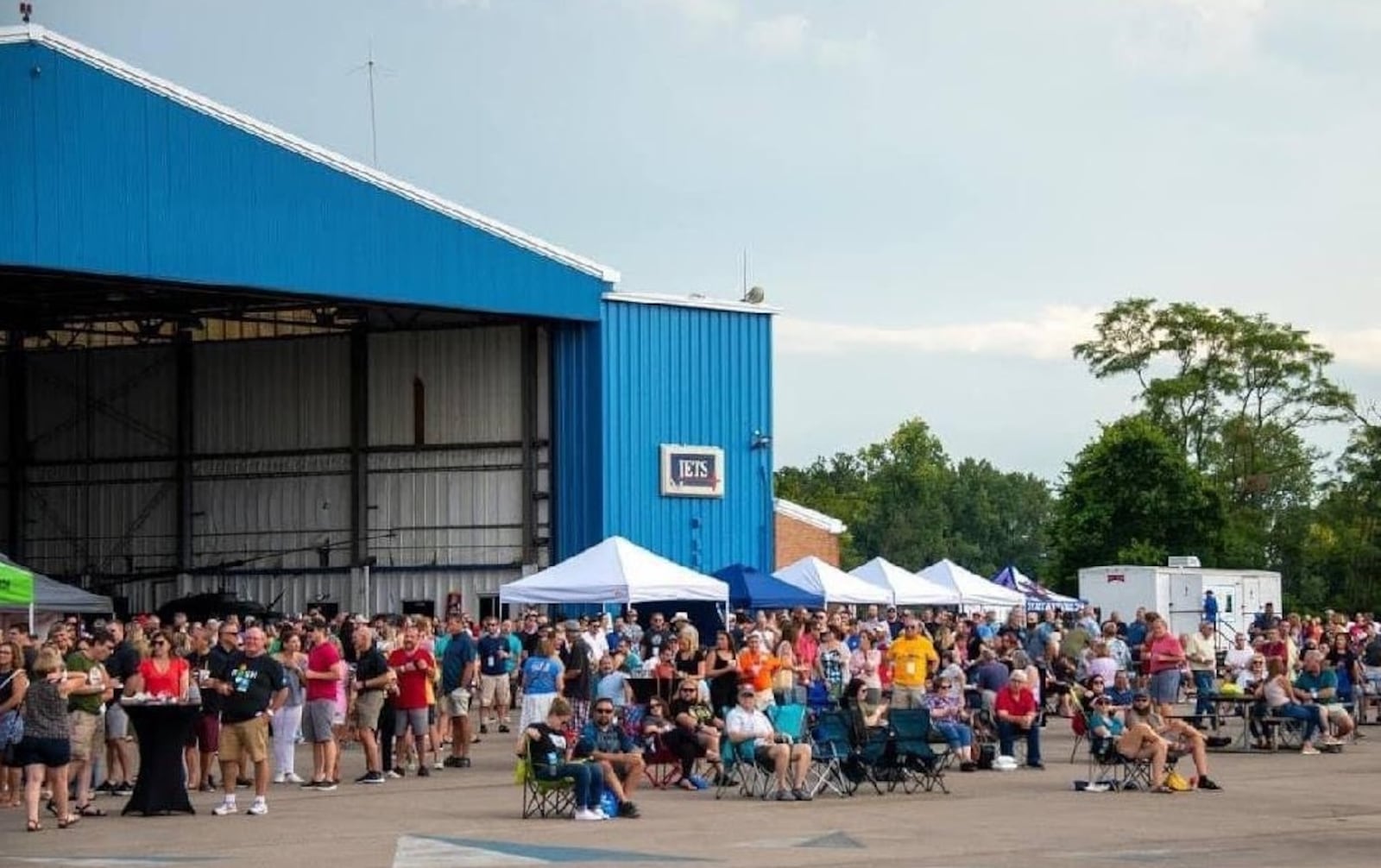 People attend "Hops in the Hangar", a beer event at the Middletown Regional Airport. CONTRIBUTED