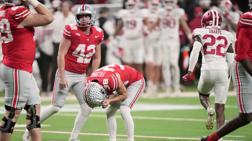 Ohio State kicker Jayden Fielding racts after missing a field goal during the second half of the Big Ten championship NCAA college football game against Indiana in Indianapolis, Saturday, Dec. 6, 2025. (AP Photo/AJ Mast)