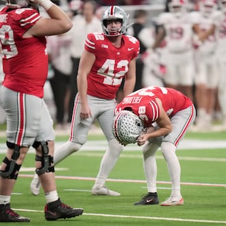 Ohio State kicker Jayden Fielding racts after missing a field goal during the second half of the Big Ten championship NCAA college football game against Indiana in Indianapolis, Saturday, Dec. 6, 2025. (AP Photo/AJ Mast)