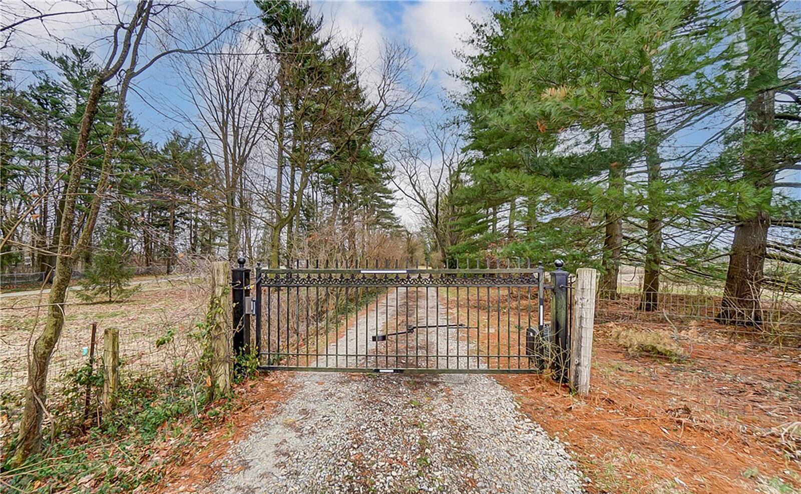 There is an automatic gate at the entrance to the property.