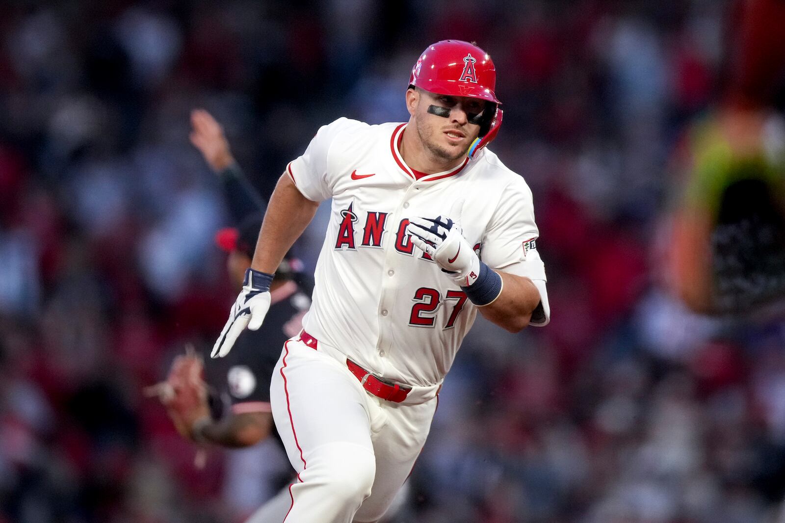 Los Angeles Angels outfielder Mike Trout runs the bases after hitting a home run during the first inning of a baseball game against the Cleveland Guardians in Anaheim, Calif., Friday, April 4, 2025. (AP Photo/Eric Thayer)