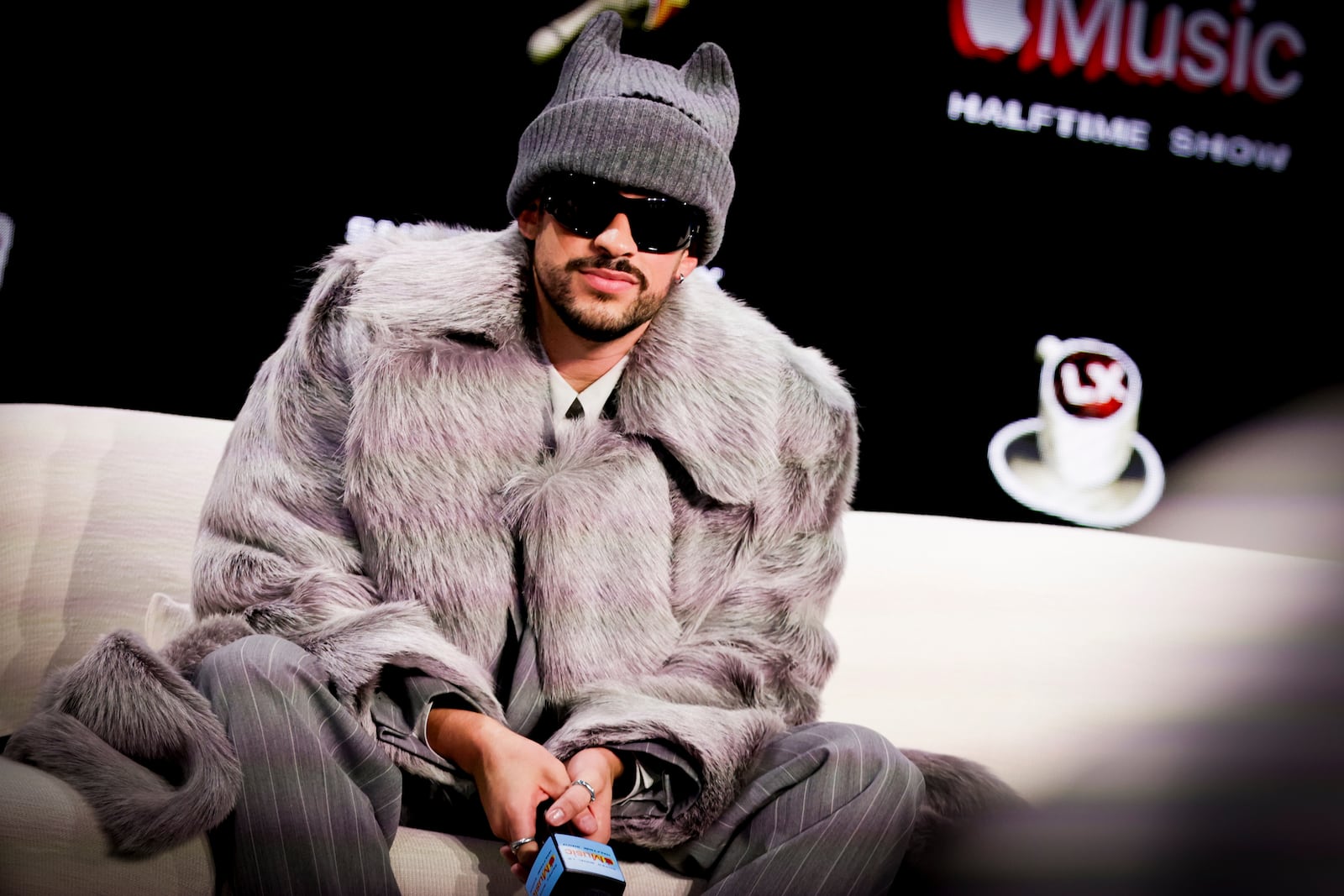 Grammy-award-winning singer and Super Bowl halftime performer Bad Bunny answers questions during a press conference at the Mascone Center during Super Bowl week in San Francisco, Thursday, Feb. 5, 2026. (Brontë Wittpenn/San Francisco Chronicle via AP)