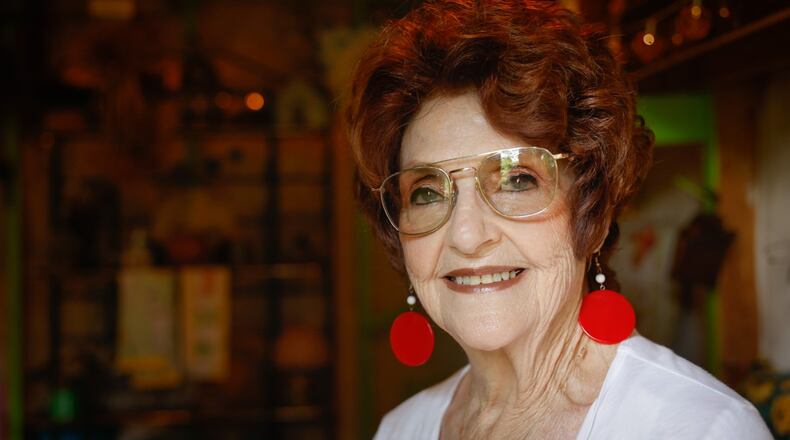 Jessie Bange's backyard has been on the Fairborn garden tour for nine years. Bange bought her home in 1994 and said every year she adds something new. JIM NOELKER/STAFF