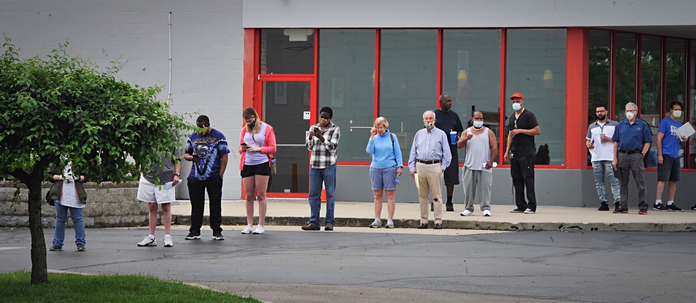 PHOTOS: Long lines as state BMV offices reopen after coronavirus shutdowns