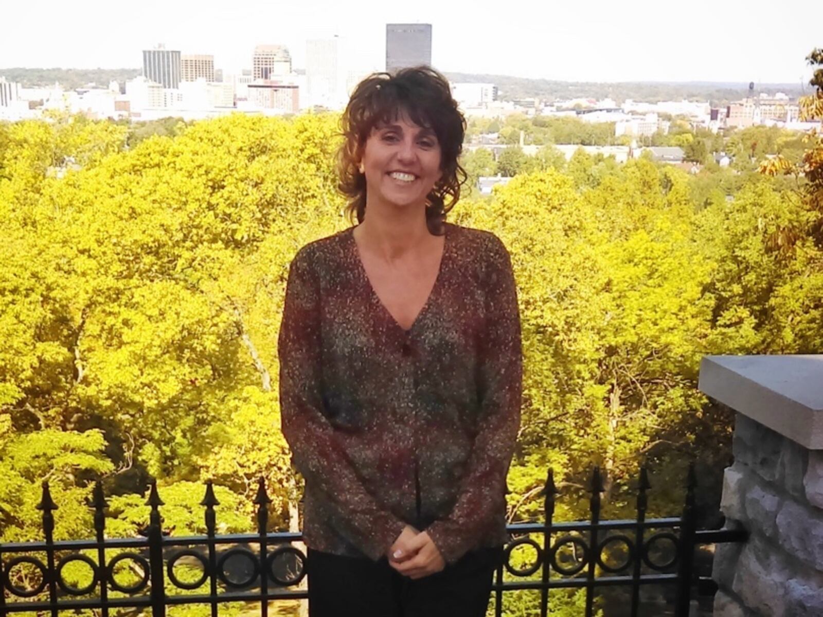 Angie Hoschouer is the manager of Development and Marketing at Woodland Cemetery and Arboretum.