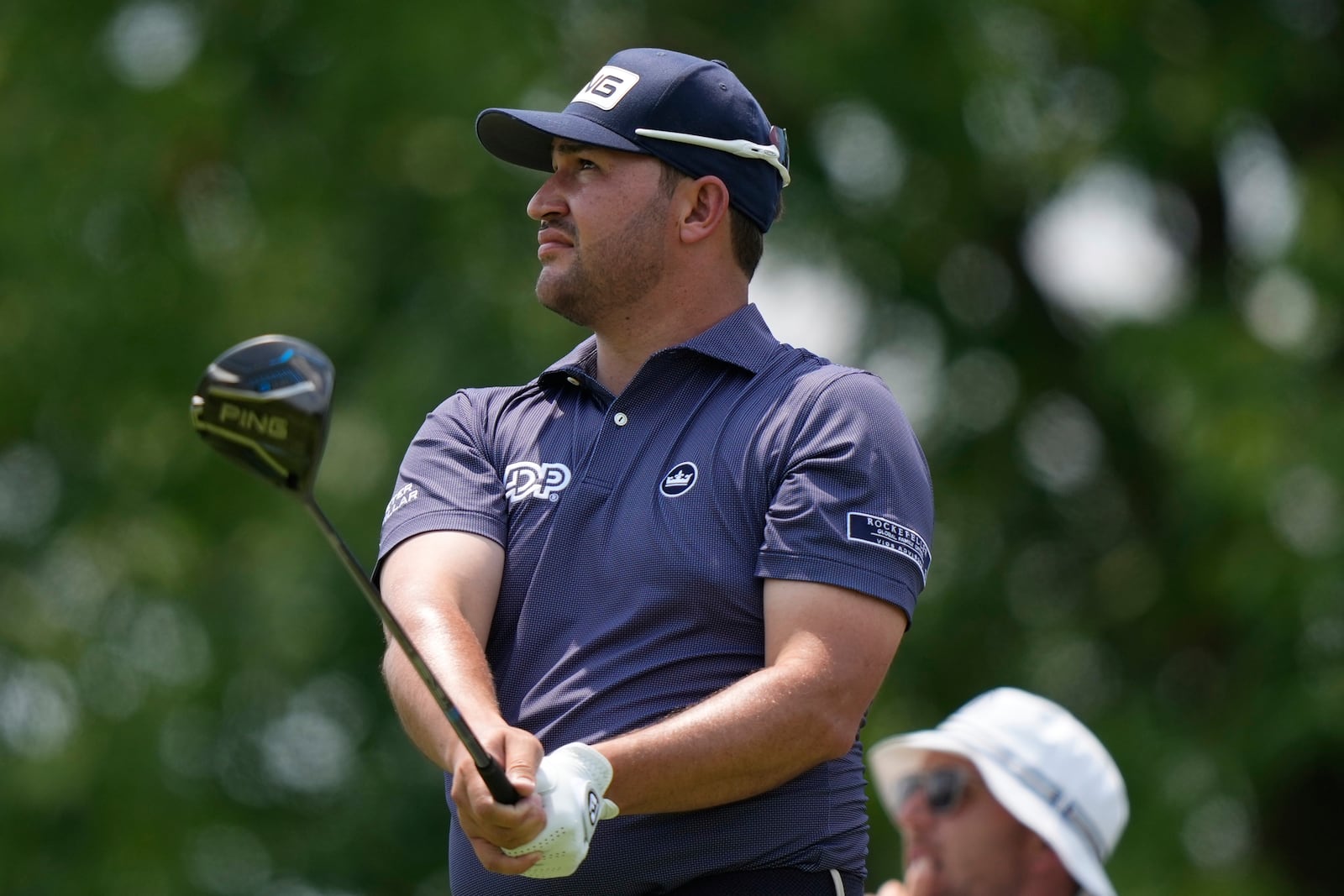 Thriston Lawrence, of South Africa, tees off on the 17th hole during the first round of the U.S. Open golf tournament at Oakmont Country Club Thursday, June 12, 2025, in Oakmont, Pa. (AP Photo/Charlie Riedel)