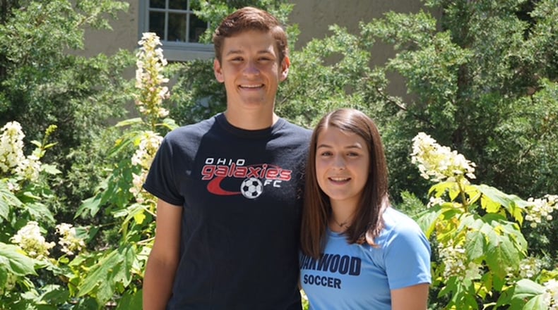 Charlie and Grace Almoney of Oakwood have started a new charity, Pass it Back Soccer. CONTRIBUTED