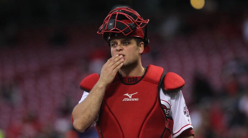 Reds catcher Devin Mesoraco plays against the Pirates on Tuesday, May 2, 2017, at Great American Ball Park in Cincinnati. David Jablonski/Staff