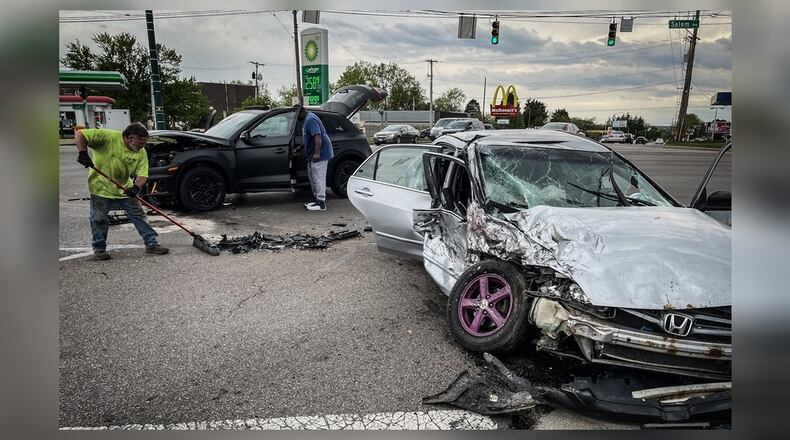 Four children were taken to area hospitals after a two-car crash Monday evening, May 10, 2021, at Salem Avenue and Free Pike in Harrison Twp. JIM NOELKER/STAFF