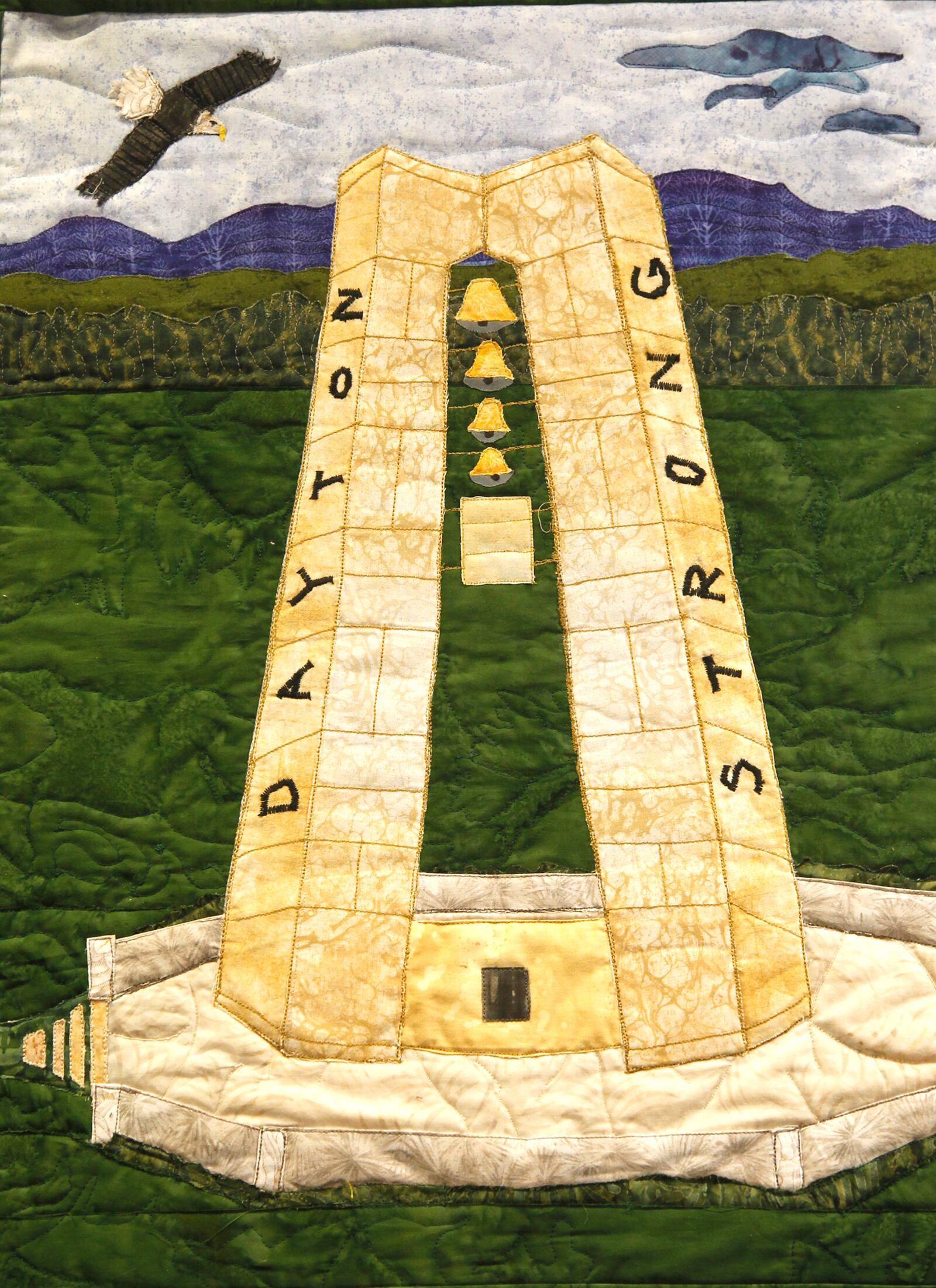 "Dayton Strong, A Quilt Show" is on display at the Woodbourne Library in Centerville through Dec. 2. The exhibition is a response to the May Ku Klux Klan rally in Dayton, the Memorial Day tornadoes and the Oregon District shootings. LISA POWELL / STAFF