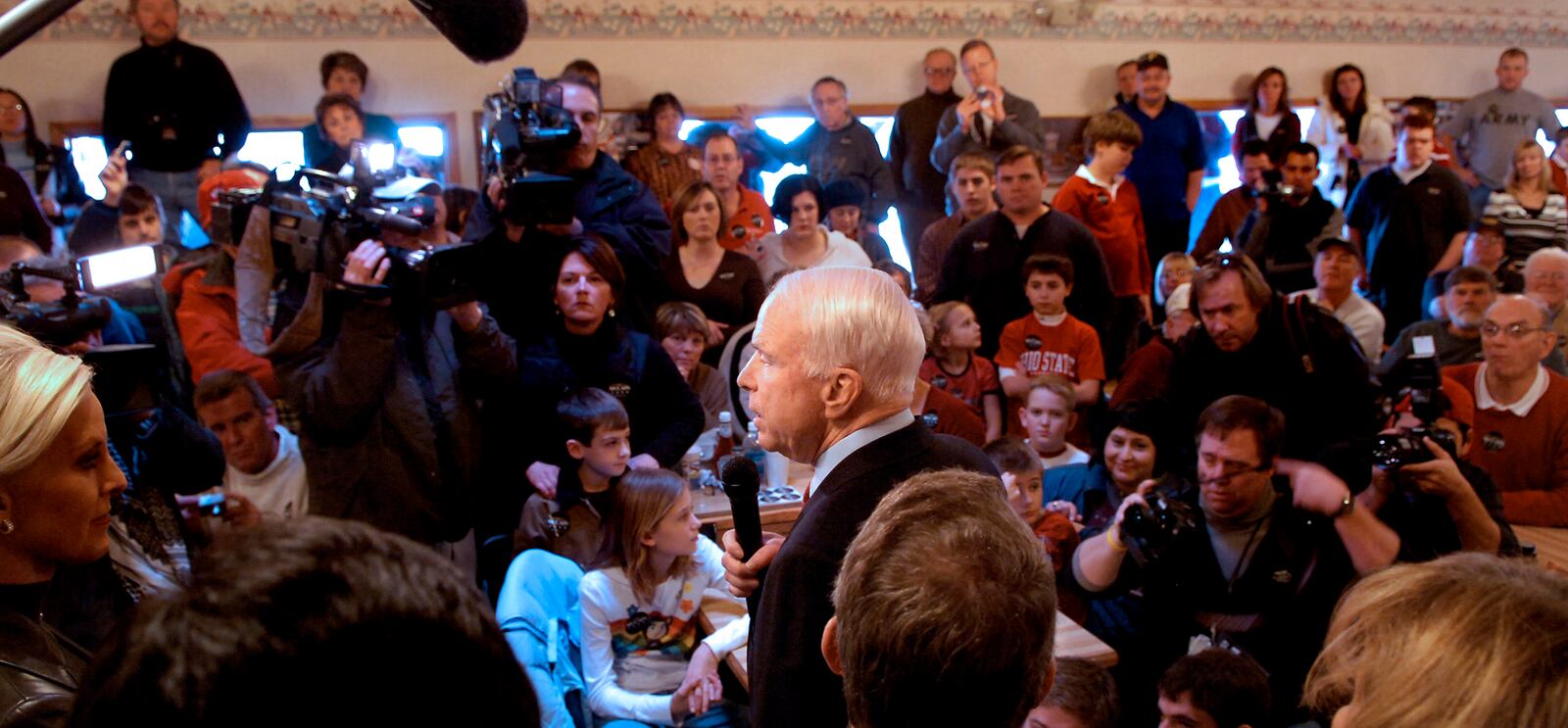 Rupublican presidential hopefull John McCain address the capacity crowd in the dinning room of Young's Jersey Dairy Wednesday during a campaign stop at the Clark County dairy. Staff photo by Marshall Gorby