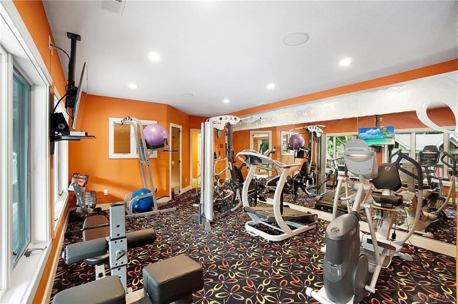 PHOTOS: Spectacular $1.8M luxury home on market with pool, golf simulator