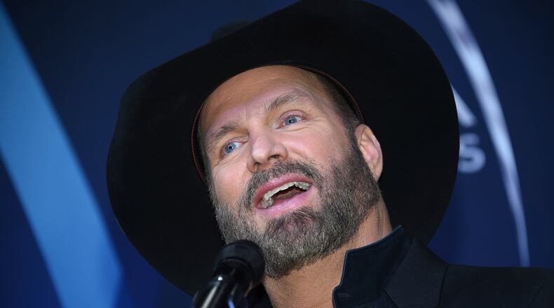 Musician Garth Brooks speaks in the press room after winning the award for entertainer of the year at the 51st annual CMA Awards at the Bridgestone Arena on Wednesday, Nov. 8, 2017, in Nashville, Tenn. (Photo by Evan Agostini/Invision/AP)