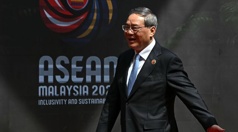 China's Premier Li Qiang arrives at the Kuala Lumpur Convention Centre to attend the 47th Association of Southeast Asian Nations (ASEAN) summit in Kuala Lumpur, Malaysia, Monday, Oct. 27, 2025. (Lillian Suwanrumpha/Pool Photo via AP)