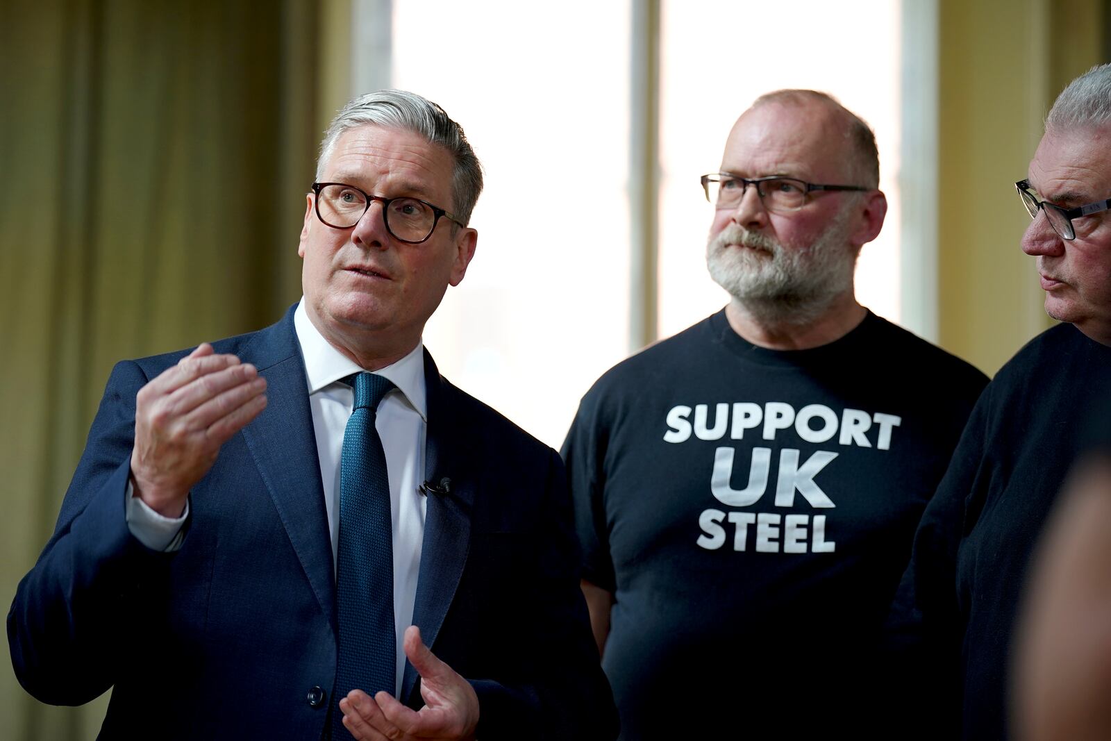 Britain's Prime Minister Keir Starmer speaks during a visit to meet British Steel workers in Appleby Village Hall near Scunthorpe, Lincolnshire, Saturday April 12, 2025. (Peter Byrne/Pool Photo via AP)