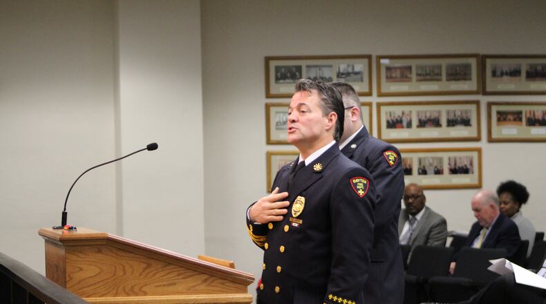 Dayton Assistant Fire Chief Jeff Lykins and Fire Prevention Specialist Bryan Adams discuss fire safety at today’s commission meeting.