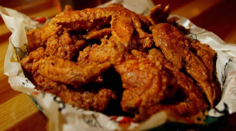 Roosters plans to add jobs when it moves from Springboro Pike in Miamisburg to a new site down the street in Miami Twp. FILE