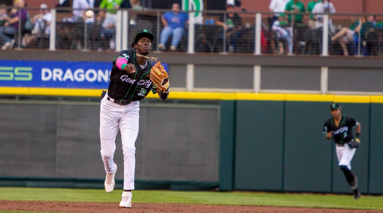 Dragons shortstop Elly De La Cruz throws a runner out at first base during Wednesday night's game against South Bend at Day Air Ballpark. Jeff Gilbert/CONTRIBUTED