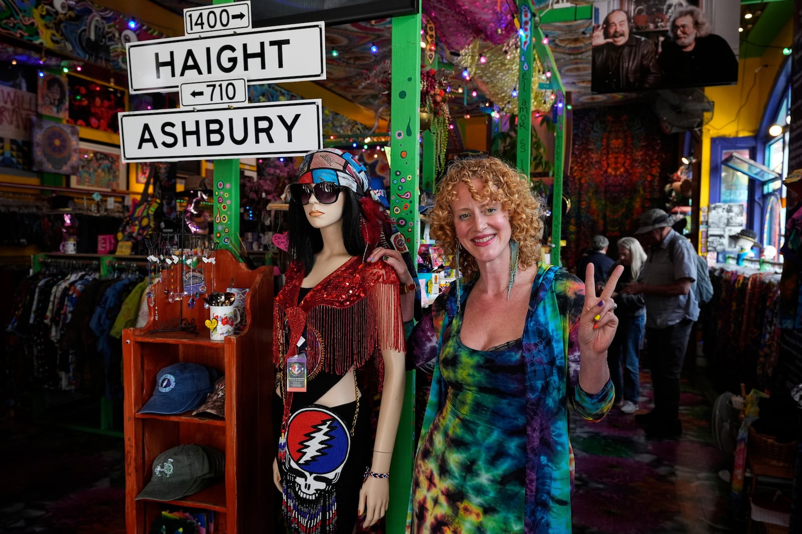 Sunshine Powers, owner of Love on Haight and fan of the Grateful Dead, poses for a photograph inside her store Saturday, July 19, 2025, in San Francisco. (AP Photo/Godofredo A. Vasquez)