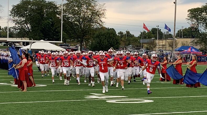 Carroll players hit Spoerl-Bartlett Field before Friday night’s home game vs. Tecumseh. Eric Frantz/CONTRIBUTED