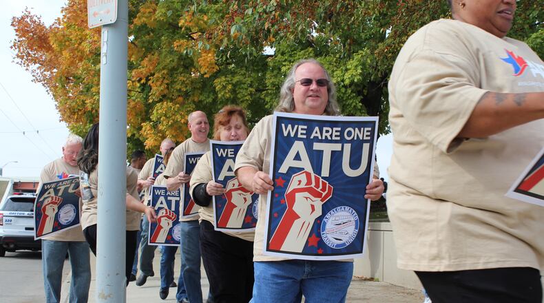 A couple dozen Greater Dayton RTA workers protest outside of the Montgomery County Administration building in late October. CORNELIUS FROLIK / STAFF