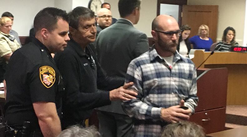 Bond was set at $25,000 for David Neanover, 36, of Reily Twp., who was charged with felony animal abuse. After Butler County Judge Robert Lyons announced the bond, several people in the courtroom applauded. RICK McCRABB/STAFF