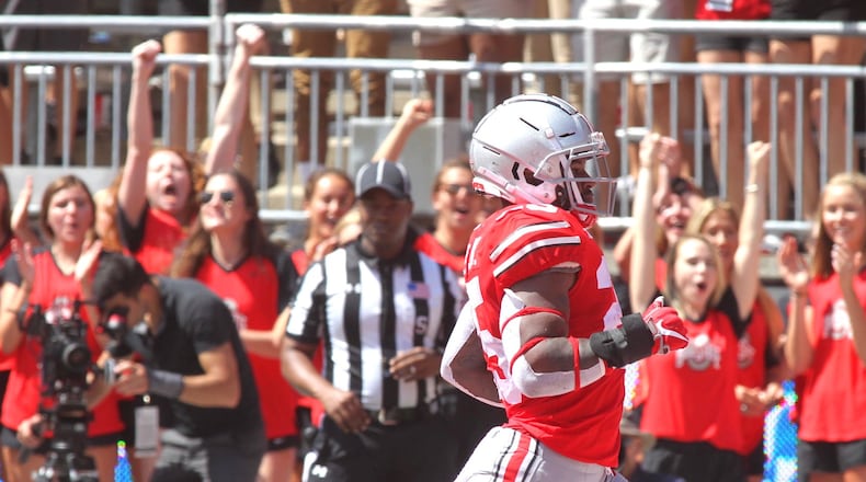 Ohio State’s Mike Weber runs for a touchdown against Oregon State on Saturday, Sept. 1, 2018, at Ohio Stadium in Columbus. David Jablonski/Staff