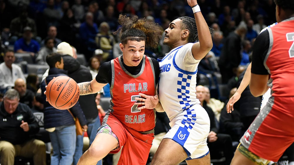 Northridge senior Dorryen Davis won't be denied on his way to the basket during Saturday's Division IV, Region 16 championship game against Wyoming at Xavier University's Cintas Center in Cincinnati. GEOFF NEVILLE / CONTRIBUTED PHOTO
