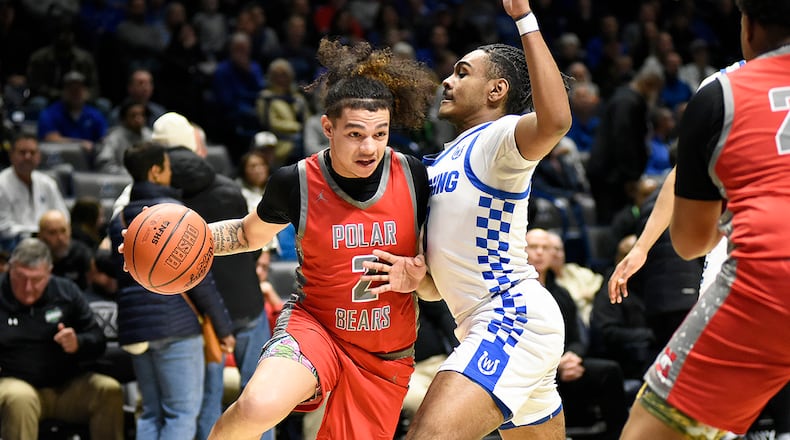 Northridge senior Dorryen Davis won't be denied on his way to the basket during Saturday's Division IV, Region 16 championship game against Wyoming at Xavier University's Cintas Center in Cincinnati. GEOFF NEVILLE / CONTRIBUTED PHOTO