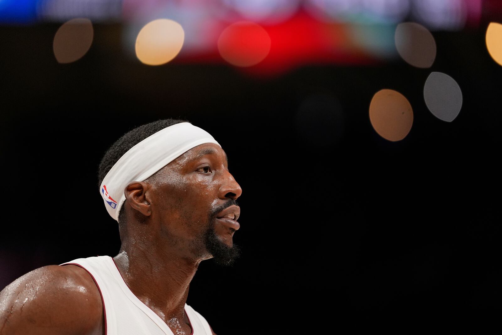 Miami Heat center Bam Adebayo (13) looks on in the first half of an NBA play-in tournament basketball game against the Atlanta Hawks, Friday, April 18, 2025, in Atlanta. (AP Photo/Brynn Anderson)