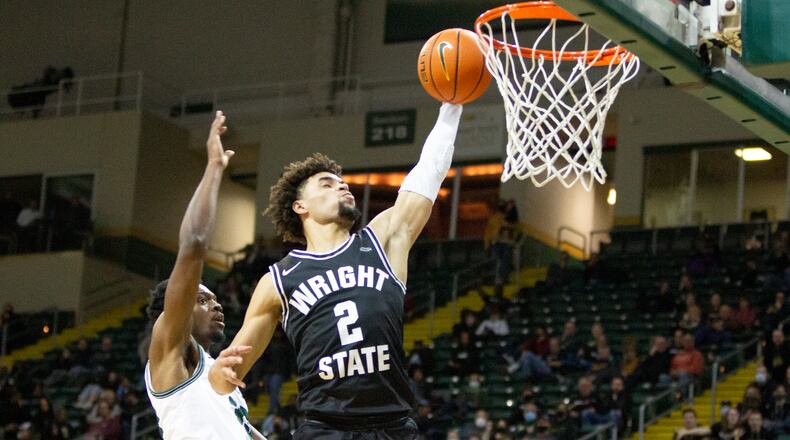 Wright State's Tanner Holden goes in for a dunk during the second half against Cleveland State at the Nutter Center on Friday, Jan. 28, 2022. Jeff Gilbert/CONTRIBUTED