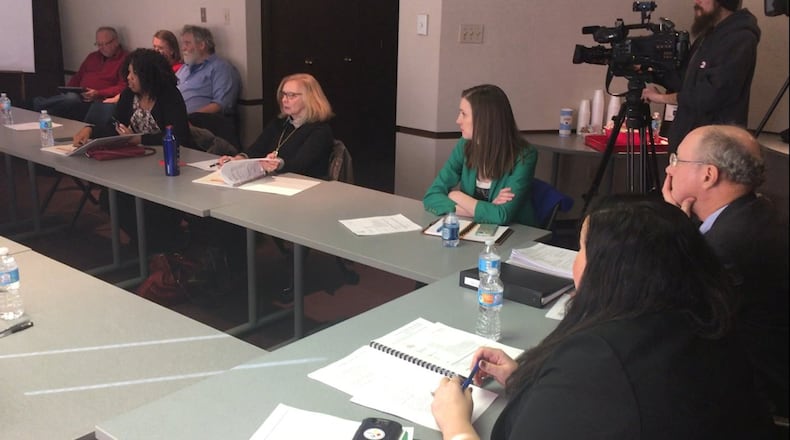 Attorneys, representatives of the city of Dayton and members of the Preschool Promise board attend the board’s first meeting Jan. 4, 2017. JEREMY P. KELLEY / STAFF
