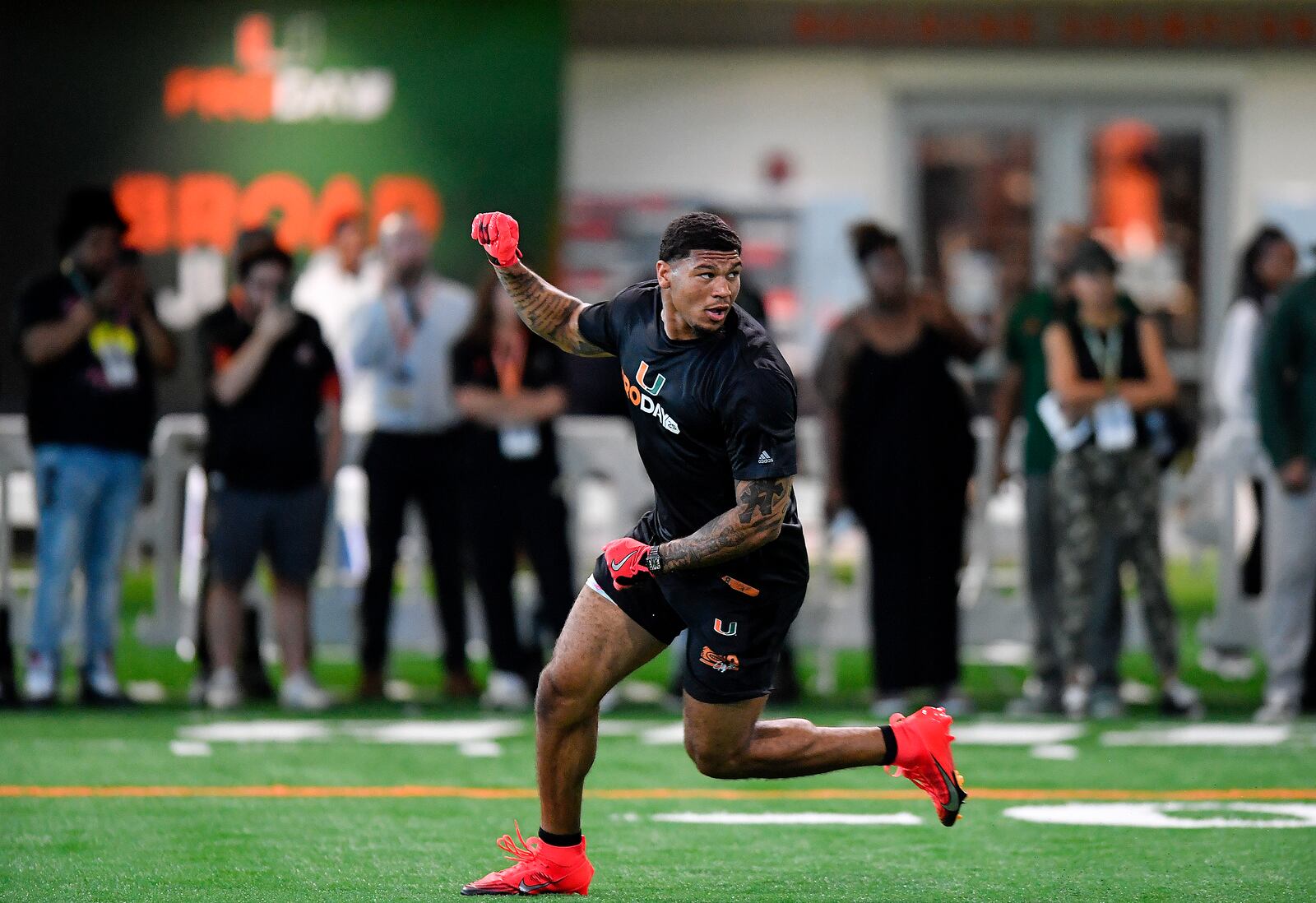 FILE - Miami tight end Elijah Arroyo runs a drill during the school's NFL football pro day on March 24, 2025, in Coral Gables, Fla. (AP Photo/Michael Laughlin, File)