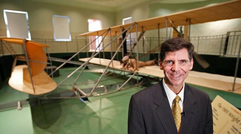 Brady Kress, Dayton History president and chief executive, with an original 1905 Wright Flyer III in a building at Carillon Park designed by Orville Wright. This airplane was flown at Huffman Prairie by the Wrights and is considered the first practical airplane as it was controlled in climb, descent, turn and bank in ever increasing duration. TY GREENLEES / STAFF