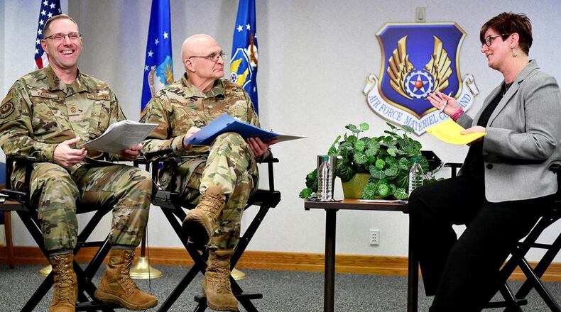 Gen. Arnold W. Bunch Jr., Air Force Materiel Command commander, and Chief Master Sgt. Stanley C. Cadell, AFMC command chief, prep for AFMC’s second virtual town hall Feb. 3 with Wendy Varhegyi, AFMC Public Affairs director at Wright-Patterson Air Force Base. (U.S. Air Force photo/Scott M. Ash)