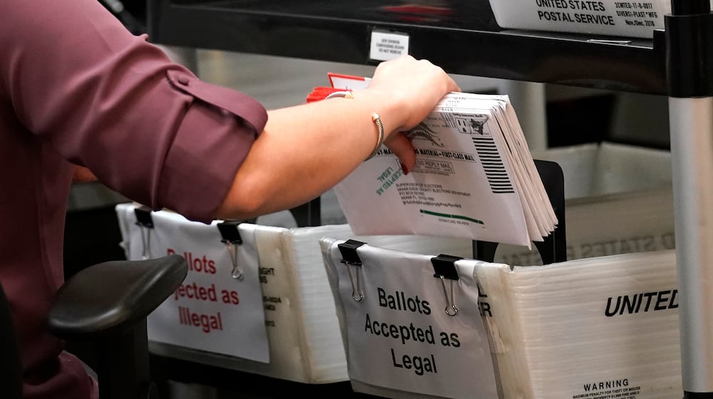 A handcount conducted Monday, Nov. 24, in the race for a Washington Twp., Miami County, trustee seat confirmed a tie vote. (AP Photo/Lynne Sladky, File)