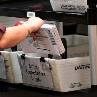 A handcount conducted Monday, Nov. 24, in the race for a Washington Twp., Miami County, trustee seat confirmed a tie vote. (AP Photo/Lynne Sladky, File)
