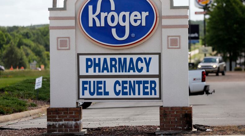 FILE - A Kroger grocery store sign promotes its pharmacy and fuel center at its Flowood, Miss., location, Thursday, June 15 2017. Kroger on Friday, Sept. 8, 2023, announced an agreement to pay up to $1.2 billion to settle lawsuits that claimed the company contributed to the U.S. opioid crisis. (AP Photo/Rogelio V. Solis, File)