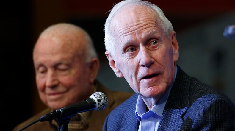 FILE - With former Illinois and New Mexico coach Lou Henson, left, by his side, retired Dayton coach Don Donoher talks about his career, during a news conference prior to a National Collegiate Basketball Hall of Fame induction event, Nov. 20, 2015, in Kansas City, Mo. Donoher, the winningest basketball coach at Dayton and a member of the National Collegiate Basketball Hall of Fame, has died. He was 92.. (AP Photo/Colin E. Braley, File)