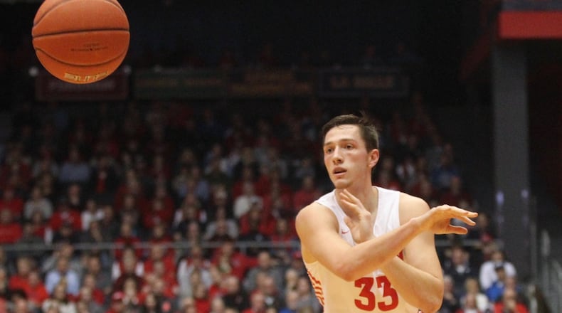 Dayton’s Ryan Mikesell throws a pass against Rhode Island on Friday, March 1, 2019, at UD Arena. David Jablonski/Staff