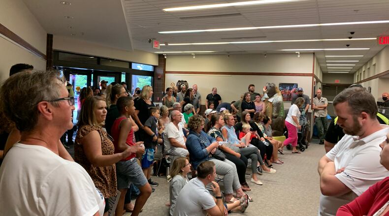 Crowds filled the lobby of the Beavercreek board of education building to protest the district's decision to mandate masks for students in grades K-6.