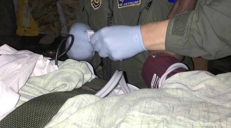 Staff Sgt. Josh O’Sullivan, an 88th Medical Group Critical Care Air Transportation team member deployed in support of Hurricane Maria relief efforts, tends to a hurricane victim in San Juan, Puerto Rico. Wright-Patterson Medical Center staff members like O’Sullivan have been poised to provide assistance for not only Hurricane Maria but also Hurricanes Harvey and Irma. (U.S. Air Force photo/Staff Sgt. Ed West)